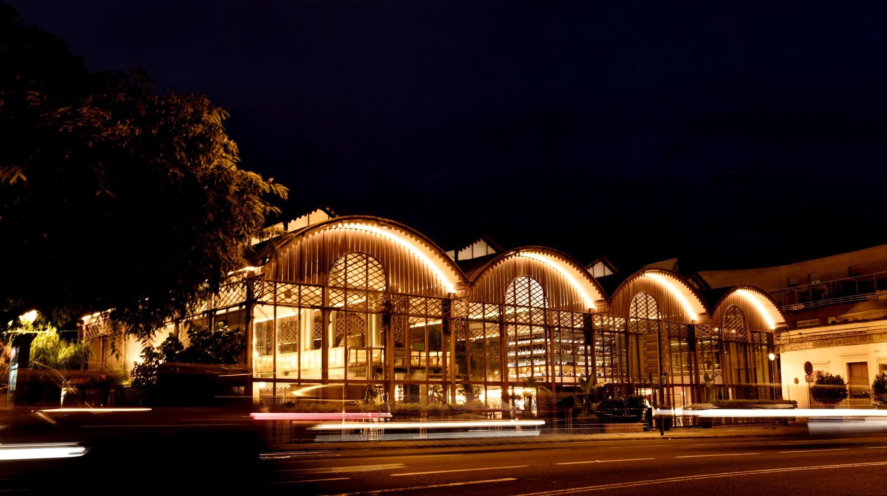 Mercado del Barranco illuminated at night